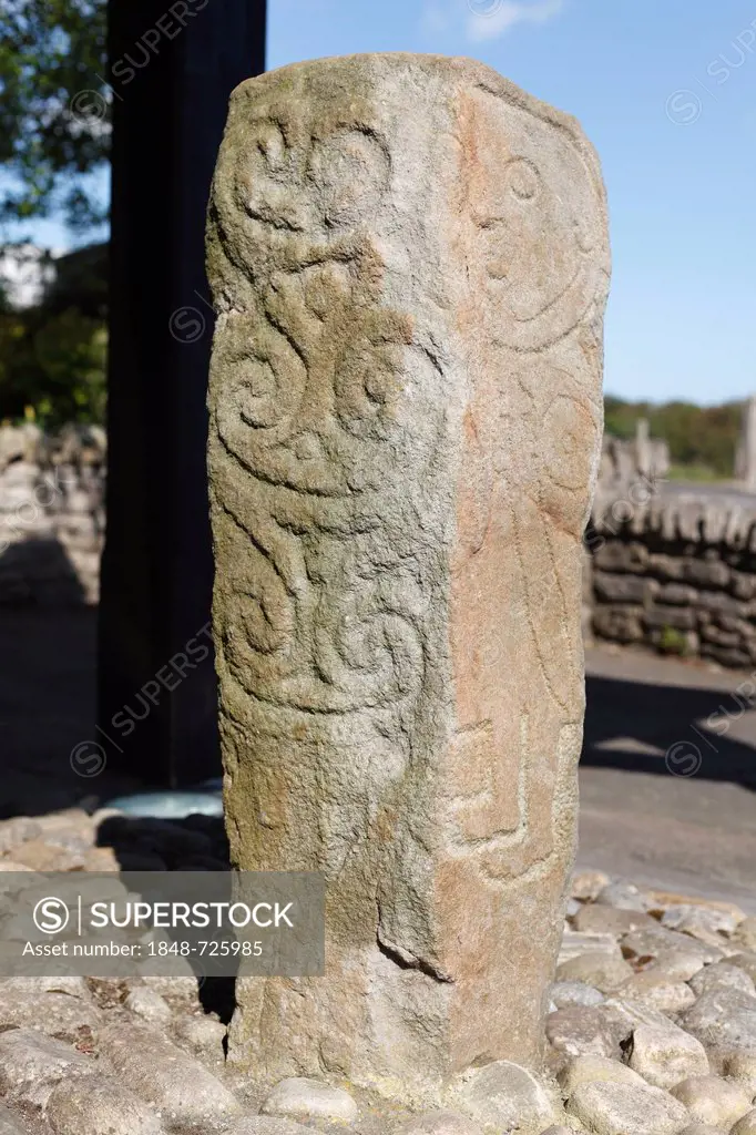 Stone pillar with a relief of Goliath with a sword on the Donagh Cross, Carndonagh, Inishowen Peninsula, County Donegal, Ireland, British Isles, Europ...