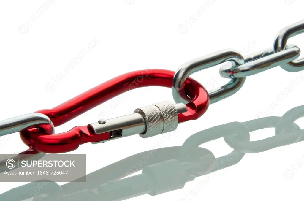 Carabiner between two stretched chains, symbolic image of cohesion, team and strong connections