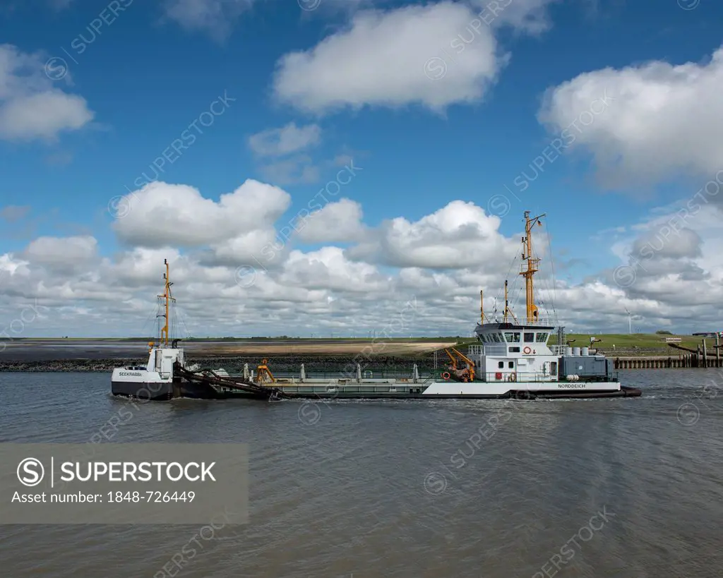 Hopper dredger, Seekrabbe, at the port entry of Norddeich, Lower Saxony Wadden Sea, Germany, Europe
