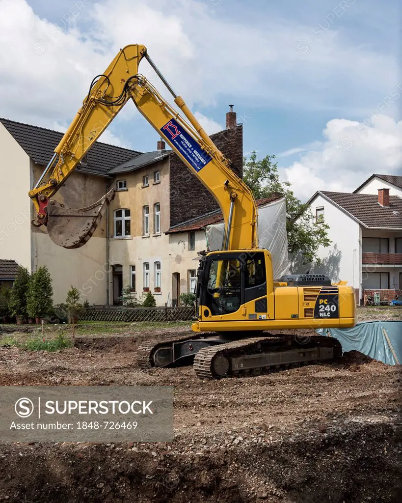 Construction, backhoe excavating land in Bonn, North Rhine-Westphalia, Germany, Europe, PublicGround