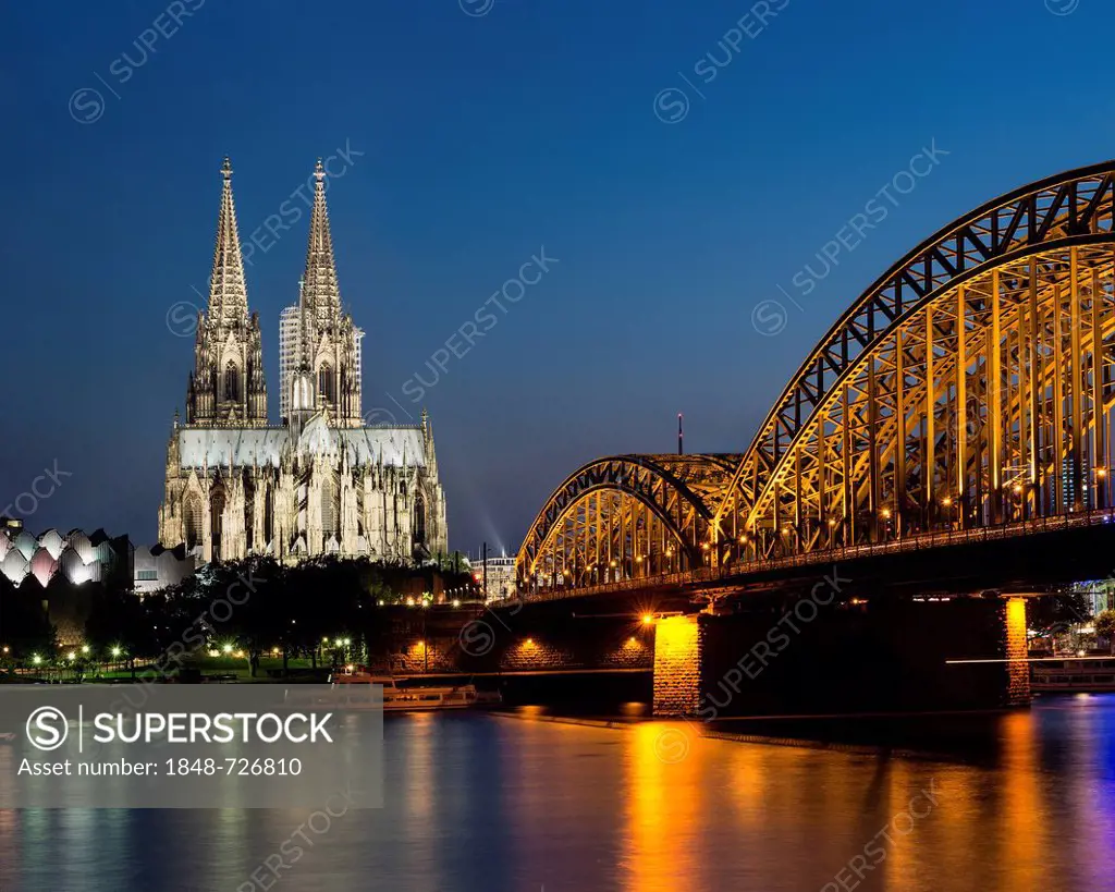 View across the Rhine River towards Museum Ludwig, Cologne Cathedral and Hohenzollern Bridge, North Rhine-Westphalia, Germany, Europe