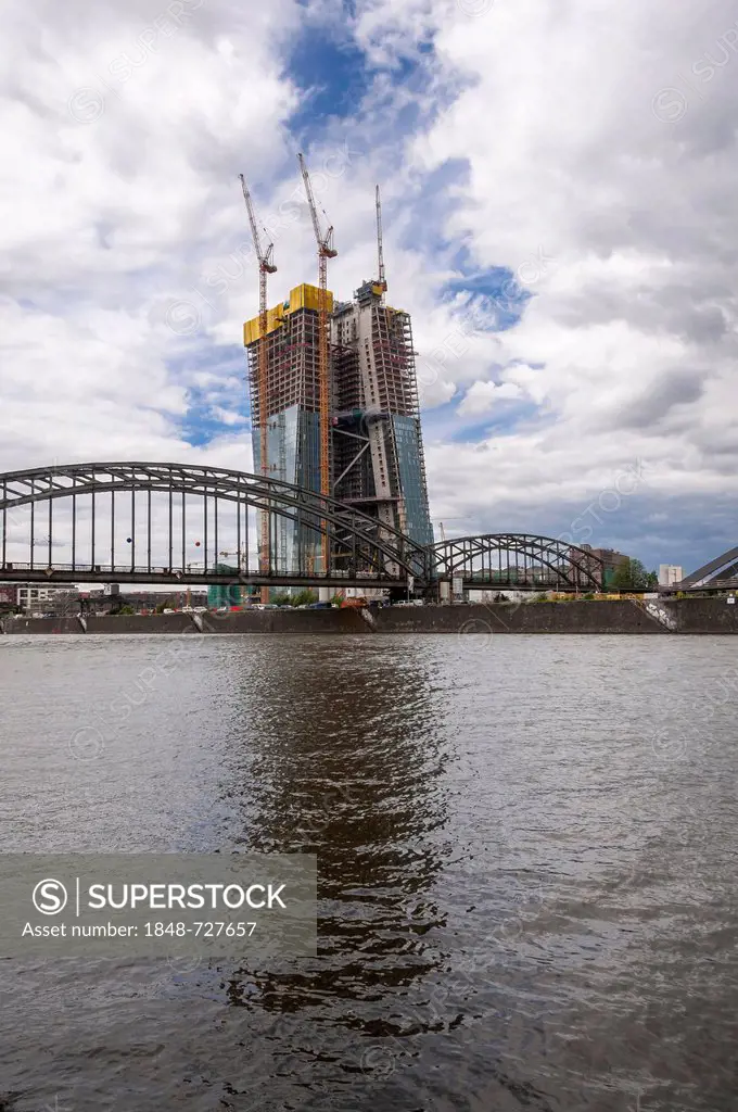 Construction site of the European Central Bank, ECB, with construction cranes on the site of the former central market hall and Deutschherrnbruecke br...