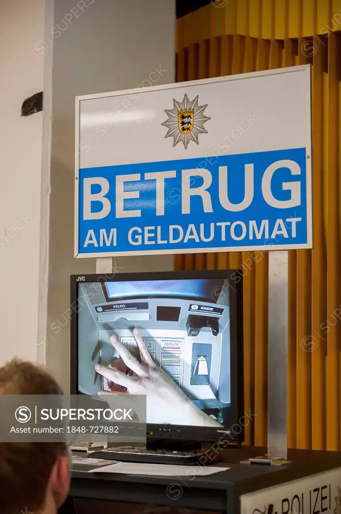 Information regarding ATM fraud, a mini camera is transmitting the input keypad to a large screen for demonstration purposes, Stuttgart, Baden-Wuertte...