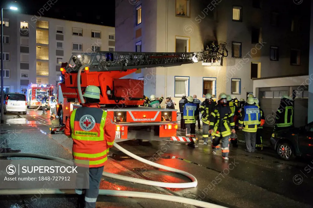 Apartment fire in an apartment building, firefighters rescueing people from a balcony, Esslingen, Baden-Wuerttemberg, Germany, Europe