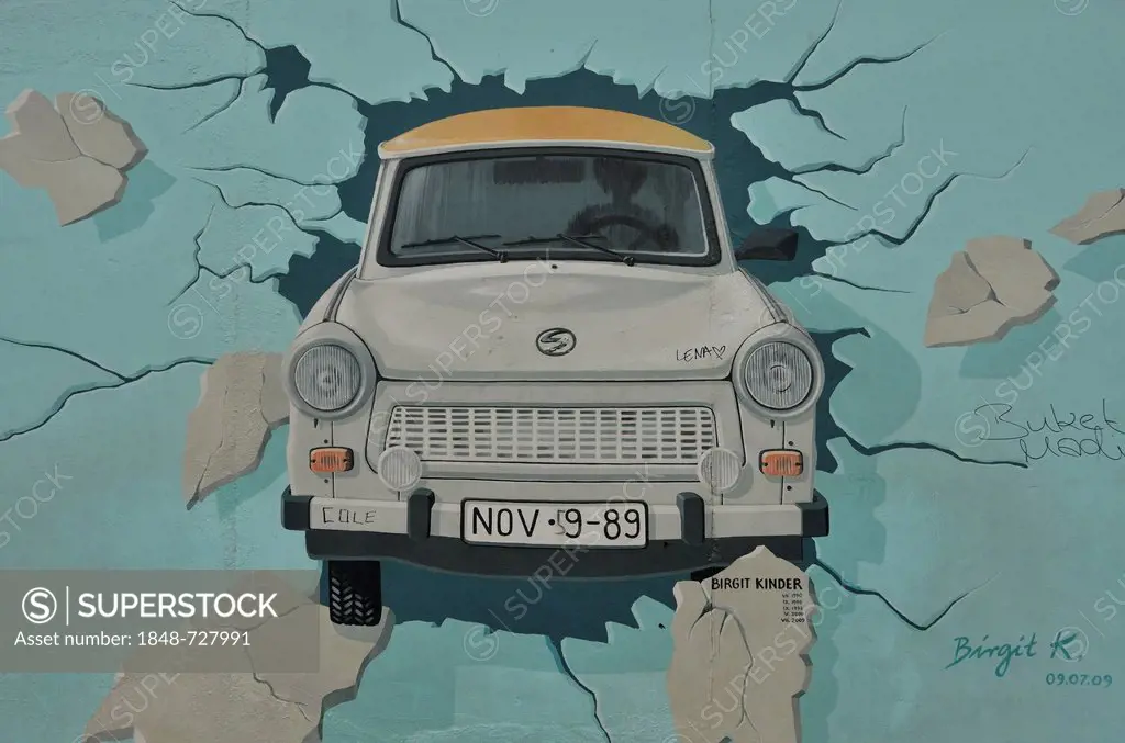 Test the Best, mural, painting of a Trabant car breaking through the Berlin Wall, by Birgit Kinder, East Side Gallery, Berlin-Friedrichshain, Germany,...