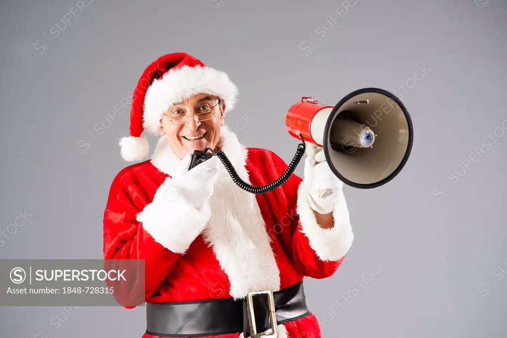 Santa shouting into a megaphone