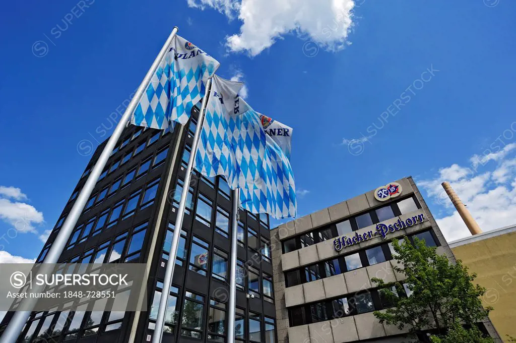 Administration building of the Paulaner brewery with flags on Nockherberg hill, Hochstrasse street 75, Munich, Bavaria, Germany, Europe