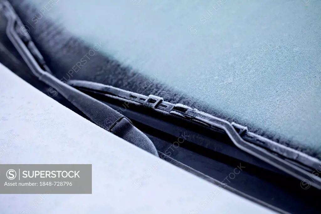 Icy car in winter, ice on the windscreen and the windscreen wipers