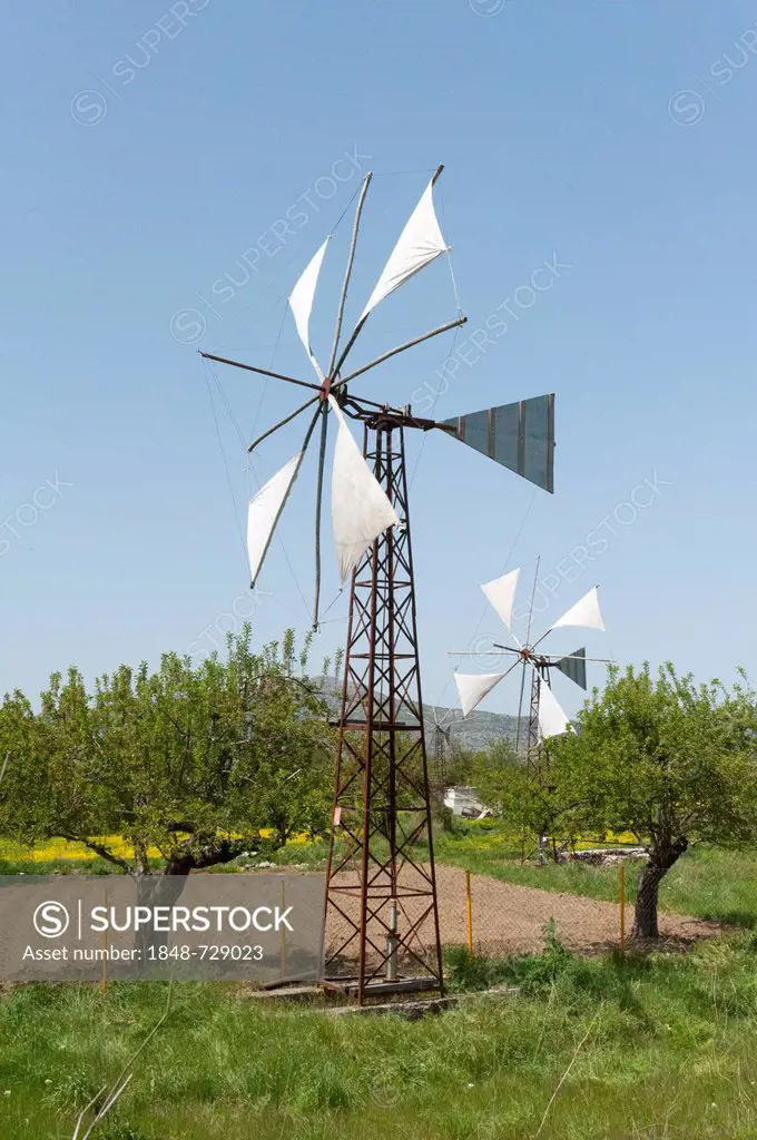 Wind energy, windmill used as a water pump for irrigation, Psychro, Lasithi Plateau, Crete, Greece, Europe