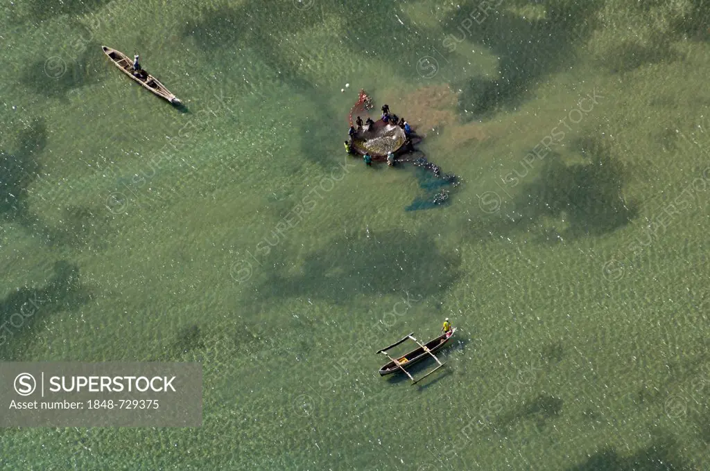 Aerial view, fishermen fishing with nets off the coast of Bagamoyo, Pwani Region, Tanzania, Africa