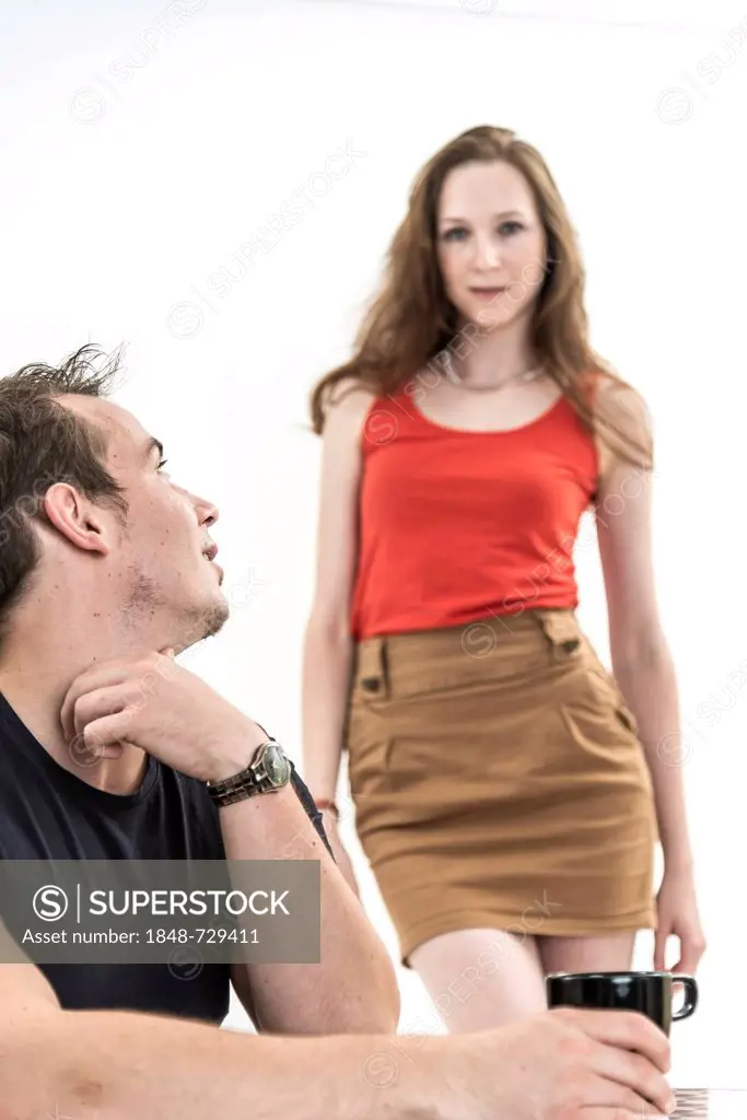 Man turning towards a woman, symbolic image for temptation