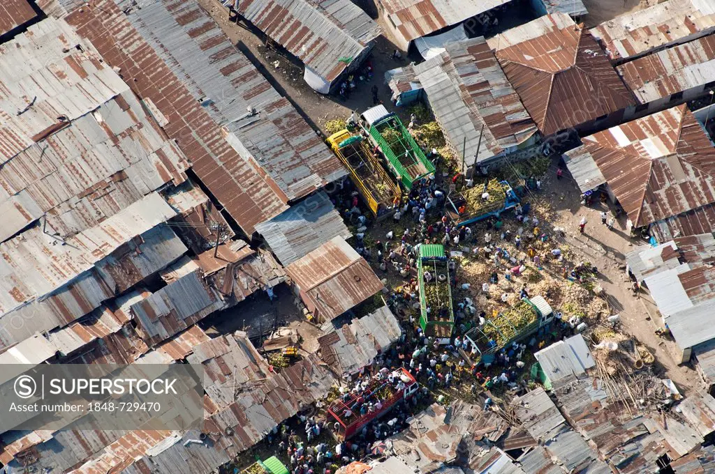 Aerial view, trucks delivering goods to a market, Dar es Salaam, Tanzania, Africa