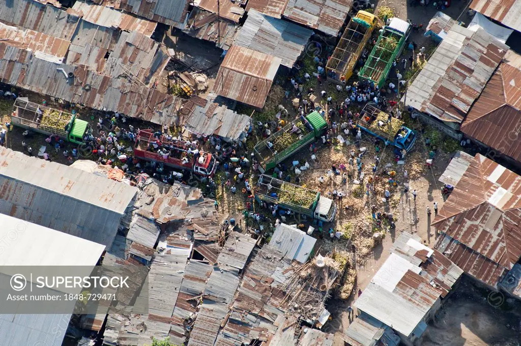 Aerial view, trucks delivering goods to a market, Dar es Salaam, Tanzania, Africa