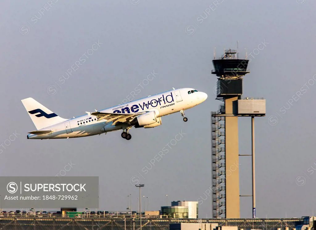 Finnair Airbus A319, Oneworld, taking off at Duesseldorf International Airport, flight control tower, Duesseldorf, North Rhine-Westphalia, Germany, Eu...