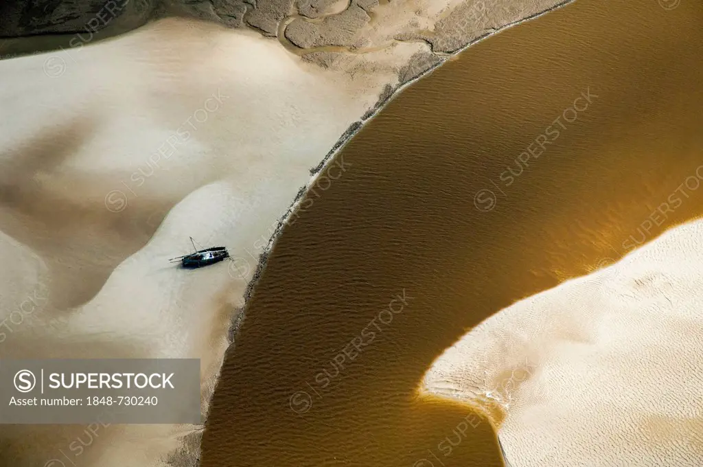 Aerial view, boat on a sand bank at a river bend, Pwani Region, Tanzania, Africa
