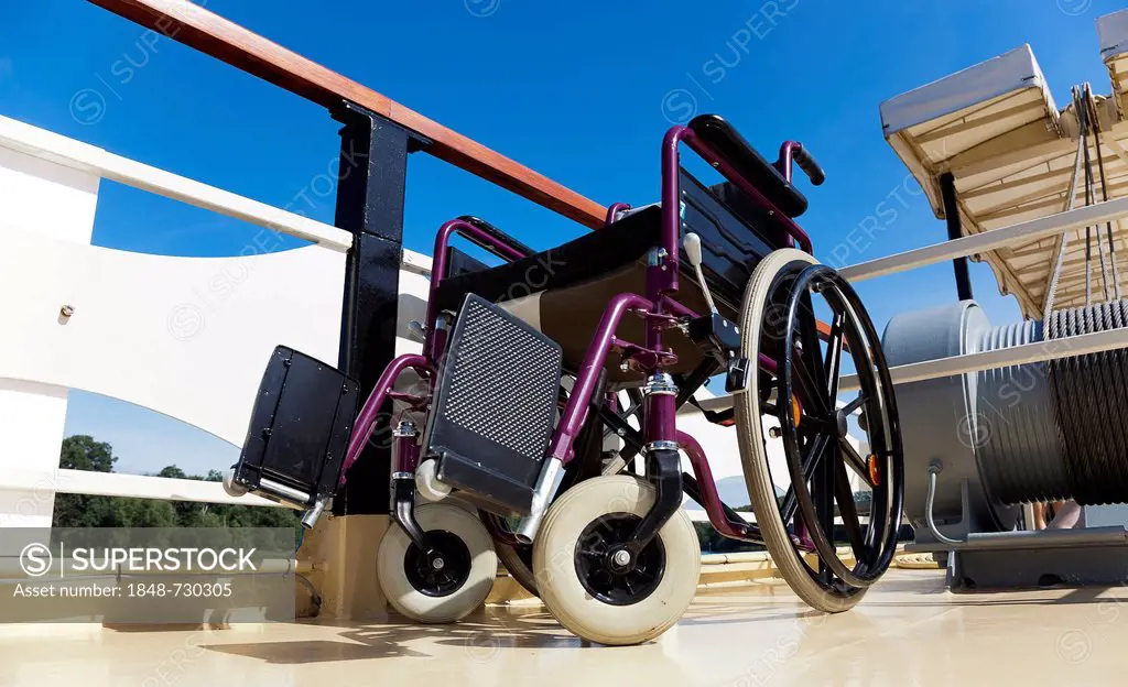 Empty wheelchair on the deck of an excursion boat, Berlin, Germany, Europe