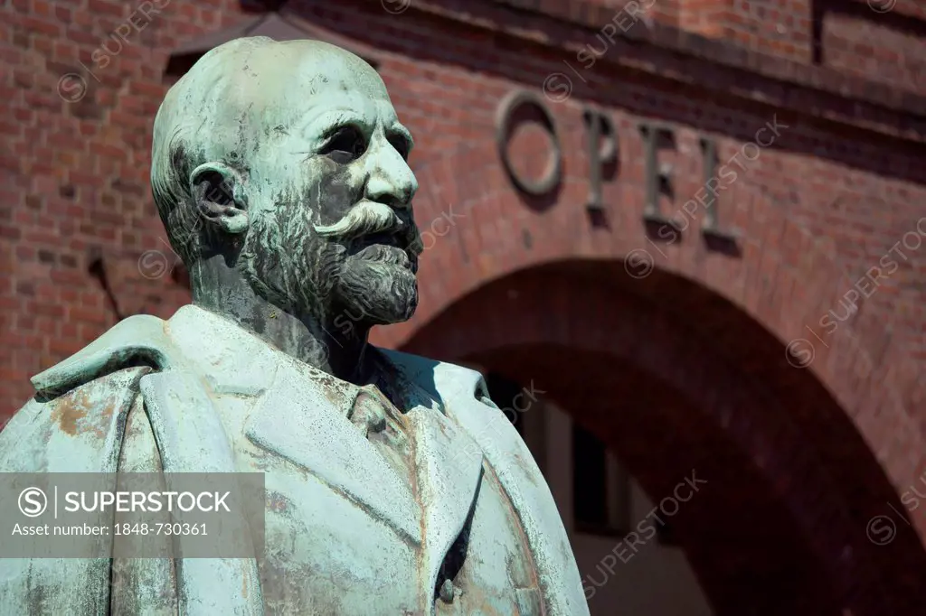 Statue of Adam Opel in front of the old portal of the Opel plant in Ruesselsheim, Hesse, Germany, Europe