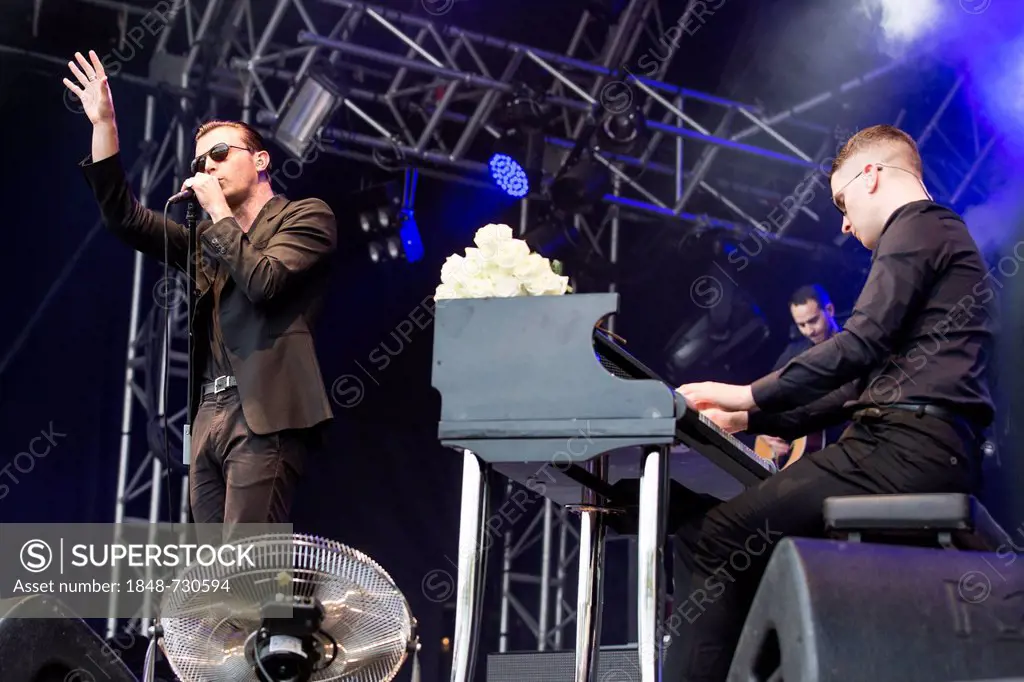 Singer Theo Hutchcraft and pianist Adam Anderson from the British synth-pop band Hurts performing live at Heitere Open Air in Zofingen, Aargau, Switze...