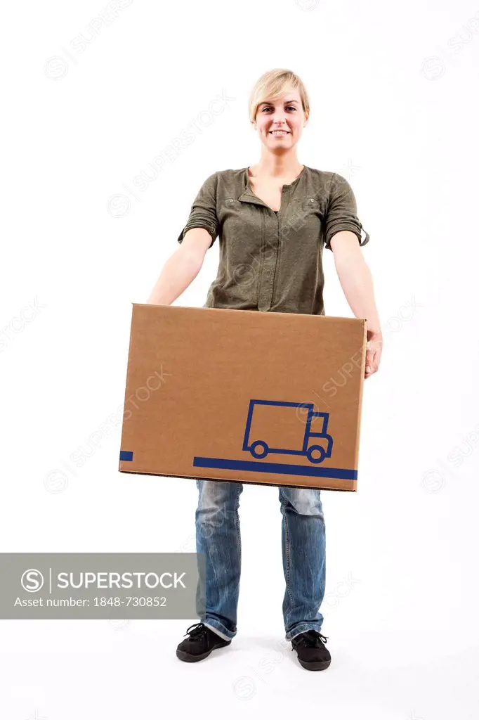 Young woman carrying a moving box