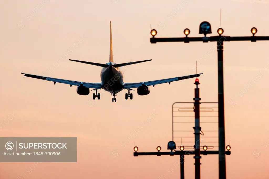Passenger jet landing at Duesseldorf International Airport, Duesseldorf, North Rhine-Westphalia, Germany, Europe