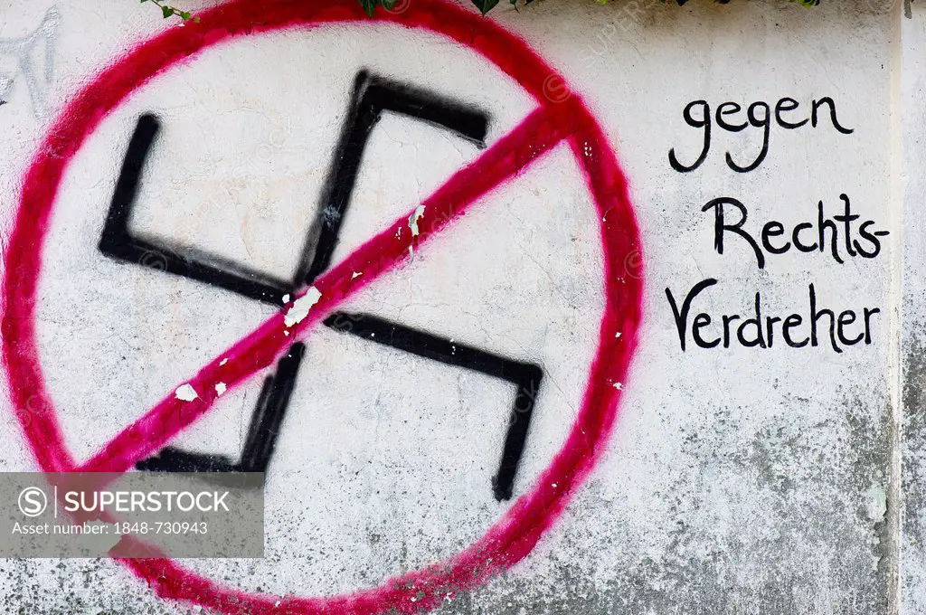 Crossed-out swastika on a wall, lettering gegen Rechts-Verdreher, German for against right-wing radicals, Tuebingen, Baden-Wuerttemberg, Germany, Euro...