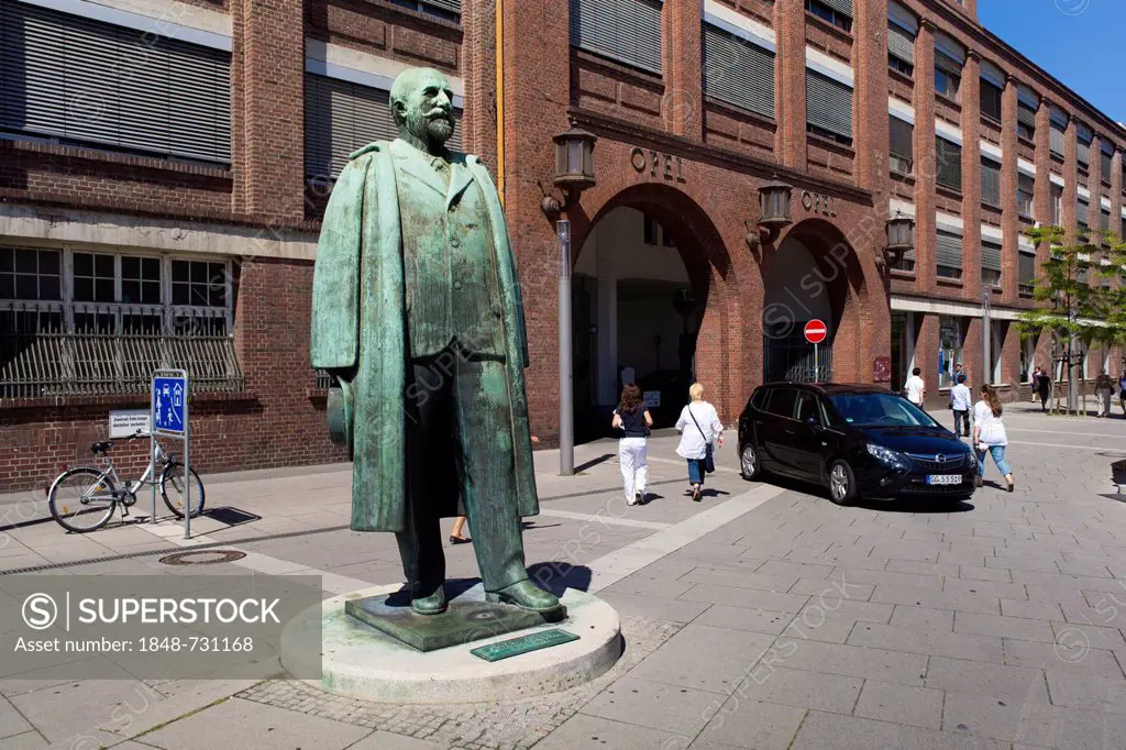 Statue of Adam Opel in front of the old portal of the Opel plant in Ruesselsheim, Hesse, Germany, Europe