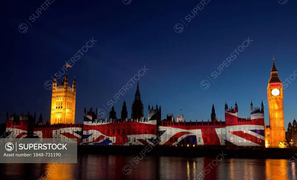 A giant image displaying the Union Flag is projected onto the facade of the Houses of Parliament for the Olympic and Paralympic Games 2012, London, En...