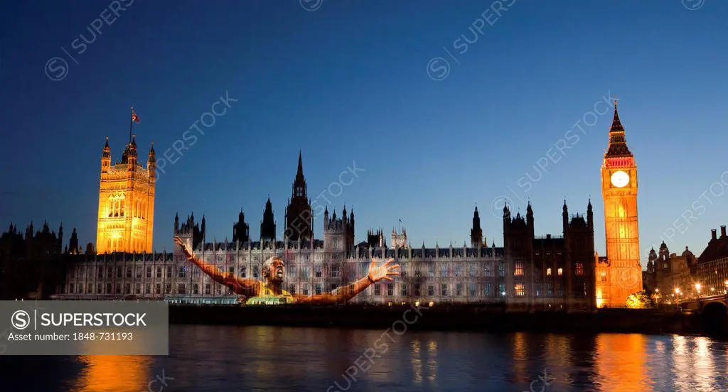 A giant image of Jamaican runner Usain Bolt is projected onto the facade of the Houses of Parliament for the Olympic and Paralympic Games 2012, London...