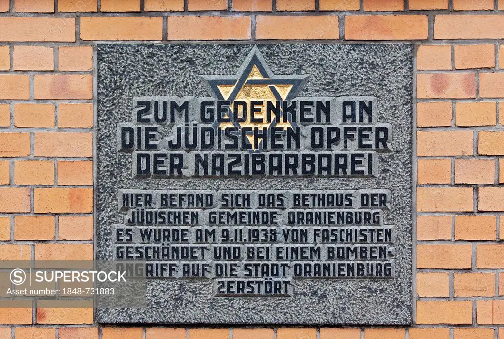Memorial, plaque in memory of the Jewish victims of Nazi barbarism, in this place there was the synagogue of the Jewish community of Oranienburg, it w...