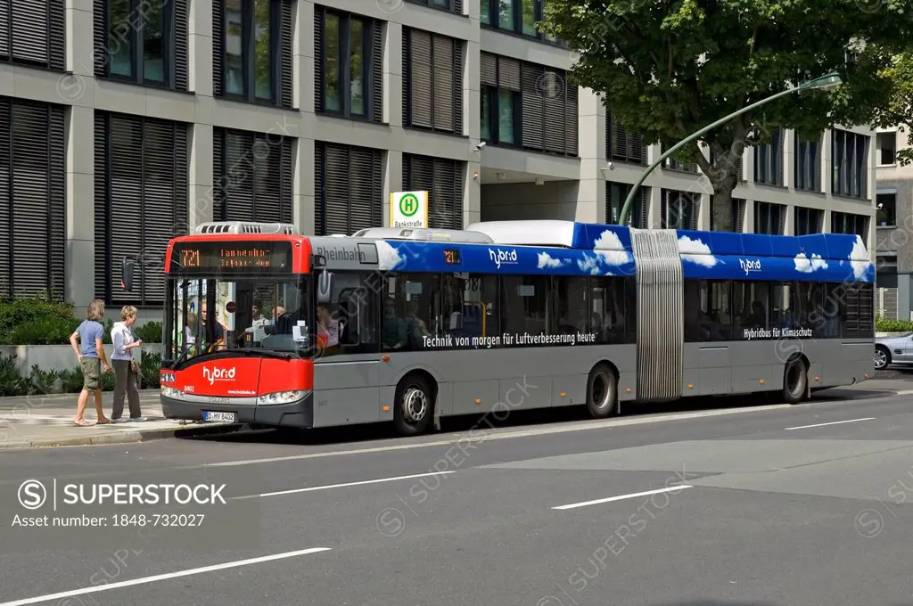 Passengers boarding a Hybrid Bus, Duesseldorf, North Rhine-Westphalia, Germany, Europe
