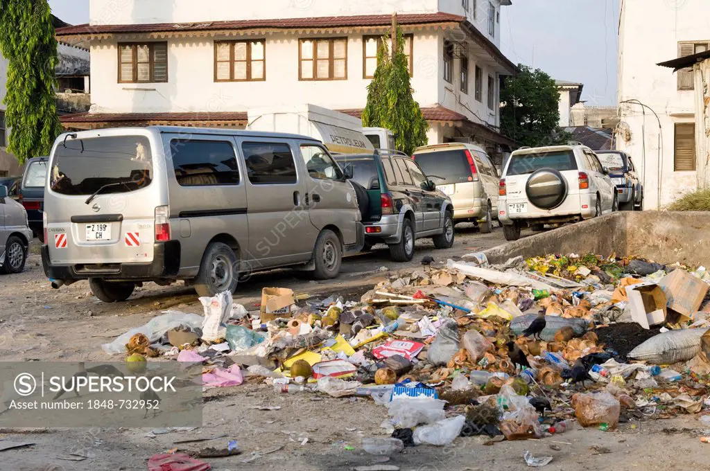 Dumped garbage in a car park, Stone Town, Zanzibar, Tanzania, Africa