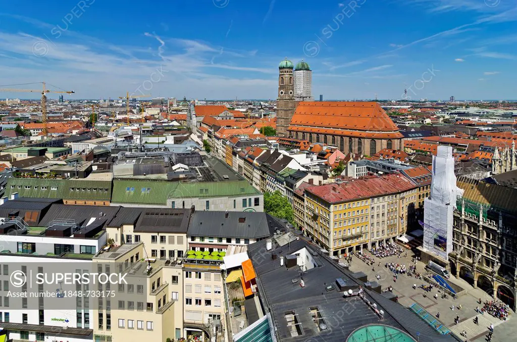 View over the roofs of Munich as seen from the steeple of the Church of St. Peter, Frauenkirche church on the right, Munich, Upper Bavaria, Bavaria, G...