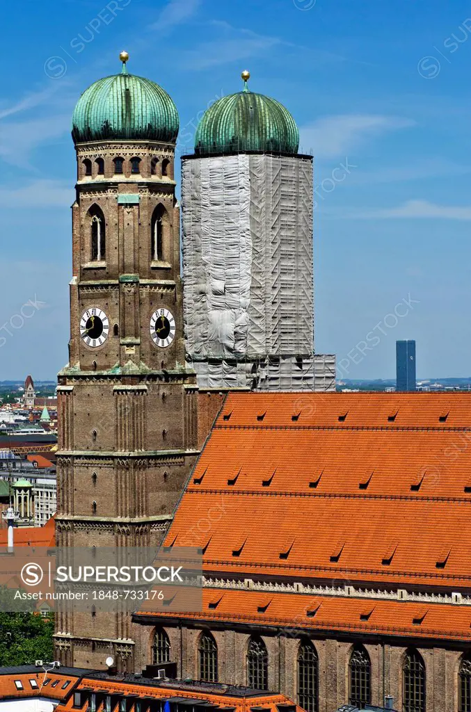 View of the steeples of Frauenkirche church as seen from the steeple of the Church of St. Peter, historic district, Munich, Upper Bavaria, Bavaria, Ge...