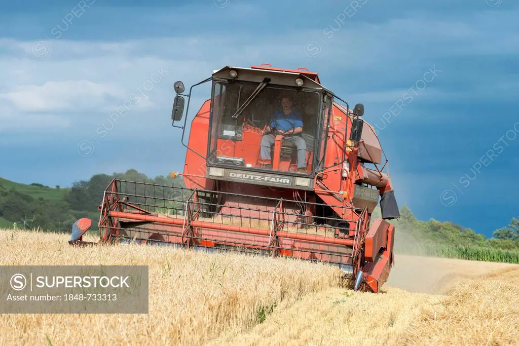 Deutz Fahr M1322H combine harvester in a wheat field, Baden-Wuerttemberg, Germany, Europe