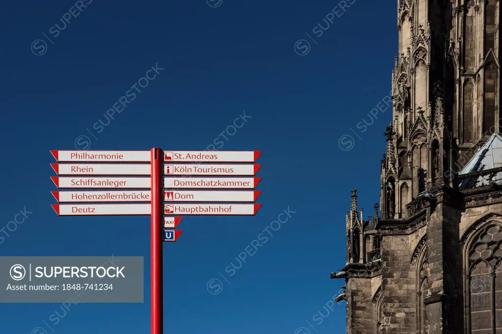 Signpost at Cologne Cathedral, Cologne, North Rhine-Westphalia, Germany, Europe
