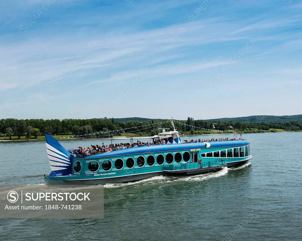 The crowded Moby Dick excursion boat floating on the Rhine river near Bonn, Bonner Personen-Schiffahrt shipping company, North Rhine-Westphalia, Germa...