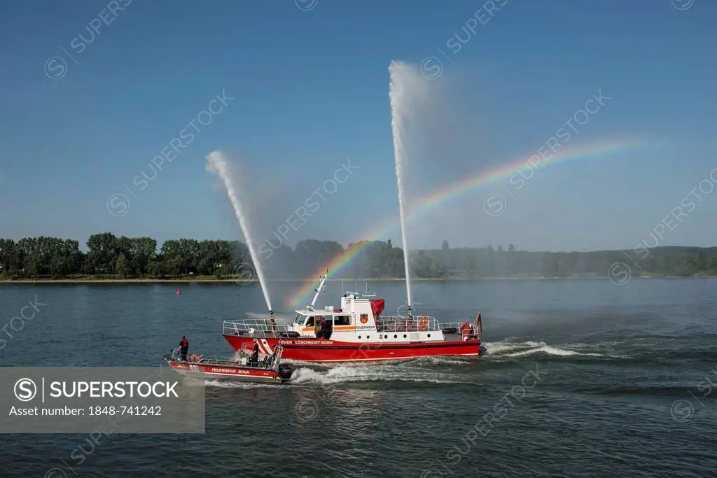 Fire drill of the Bonn fire brigade, a fire fighting boat with 3 fountains, accompanied by a smaller fire fighting boat, Bonn, North Rhine-Westphalia,...