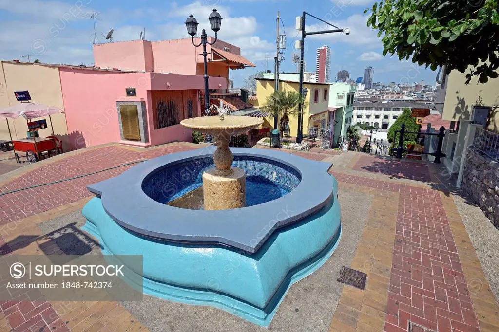 Fountain and colourful houses in the Las Penas neighbourhood on Cerro Santa Ana, Guayaquil, Ecuador, South America