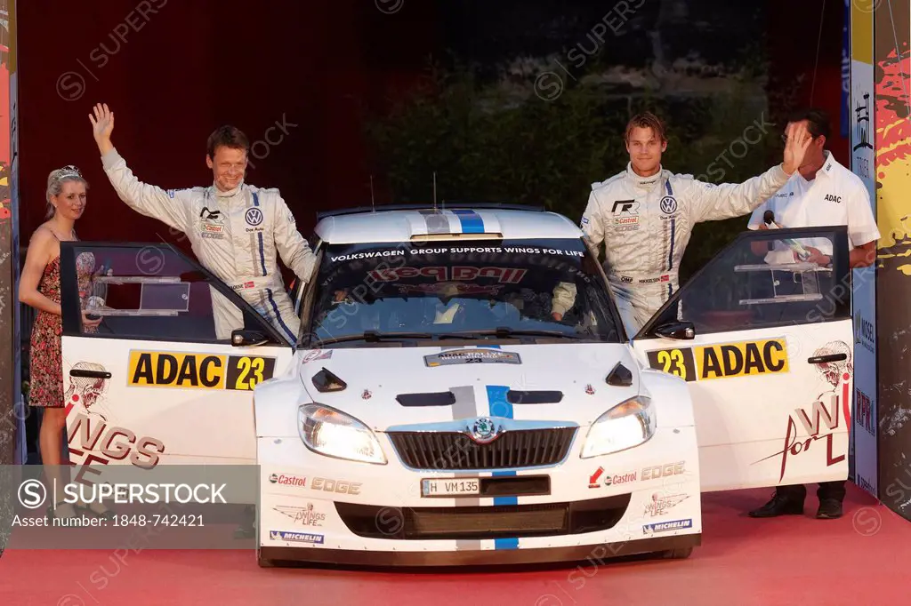 Andreas Mikkelsen, right, and Ola Floene starting at the Porta Nigra in a Skoda vehicle to the ADAC Rally Germany, Trier, Rhineland-Palatinate, German...