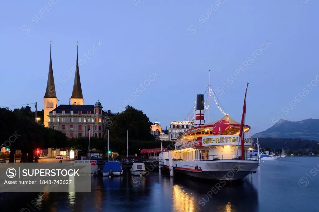 Floating restaurant in front of the Hofkirche St. Leodegar church, Lucerne, Switzerland, Europe