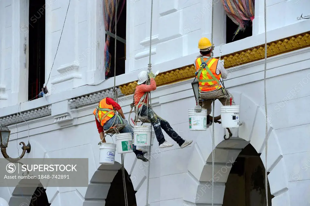 Painting and decoration work at a historic building in the old town of Guayaquil, Ecuador, South America