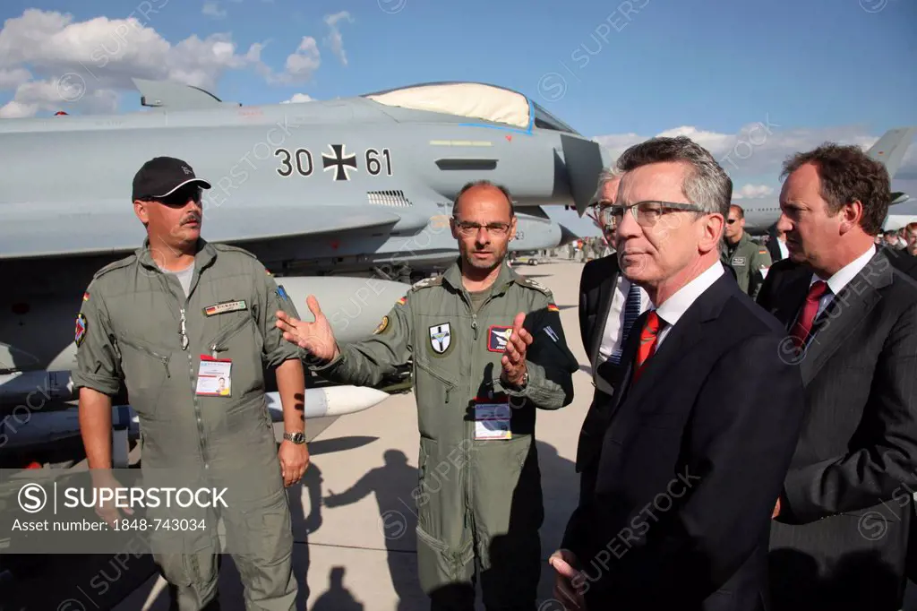 German Federal Defence Minister Thomas de Maiziere talking to German soldiers, ILA Berlin Air Show, Berlin, Germany, Europe