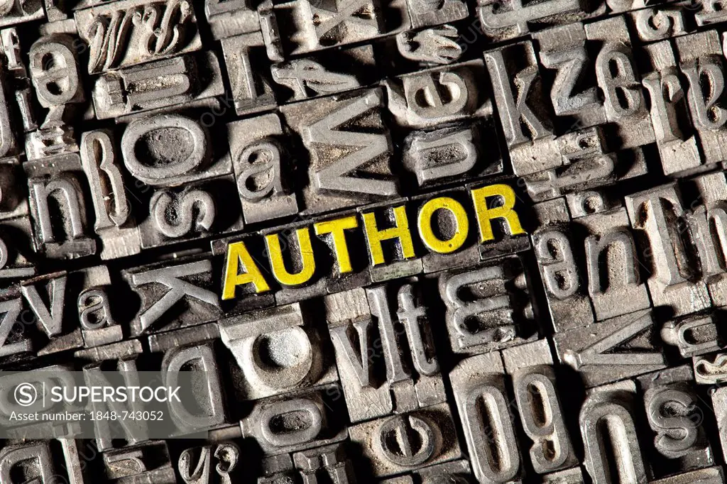 Old lead letters forming the word author