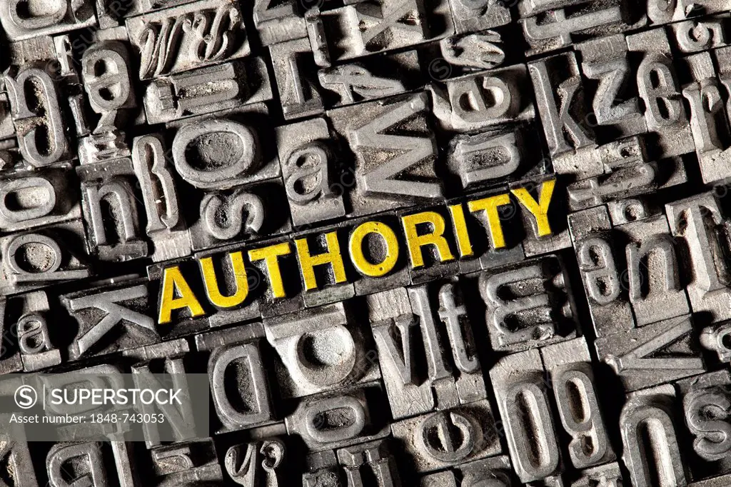 Old lead letters forming the word authority
