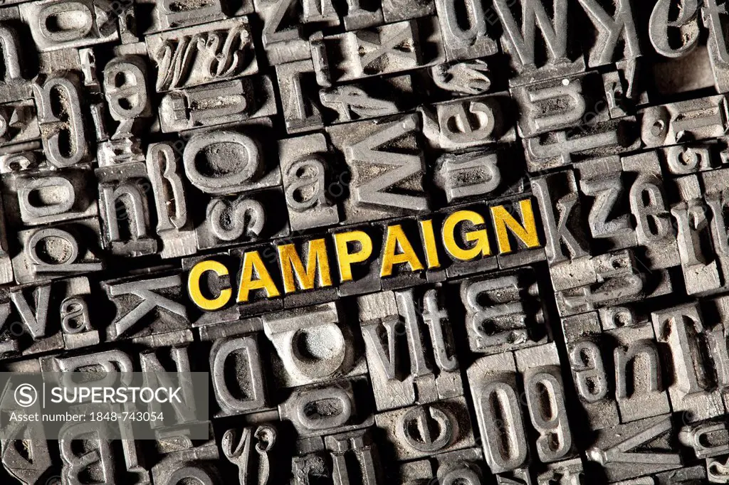 Old lead letters forming the word campaign
