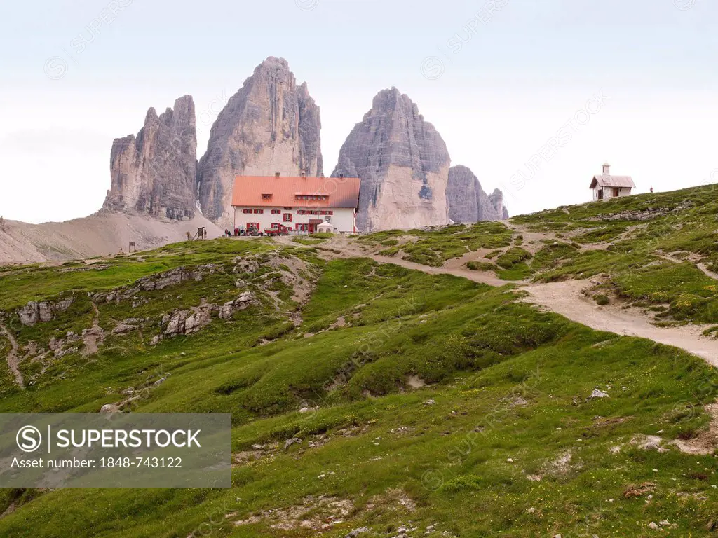 The peaks of Tre Cime di Lavaredo with Dreizinnenhuette mountain hut, Dolomiti di Sesto National Park, Sexten Dolomites, Hochpustertal, High Puster Va...