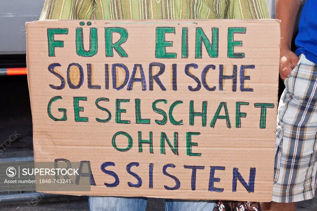 Sign Fue eine solidarische Gesellschaft ohne Rassisten, German for for a community in solidarity without racists, Left Party, die Linke, SPD, anti-fas...