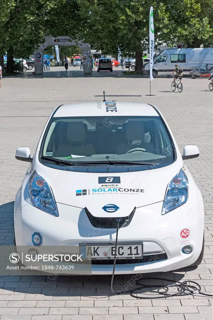 Nissan's electric vehicle having its batteries charged before the prologue of the e-miglia 2012 from Munich to St. Moritz, Munich, Bavaria, Germany, E...