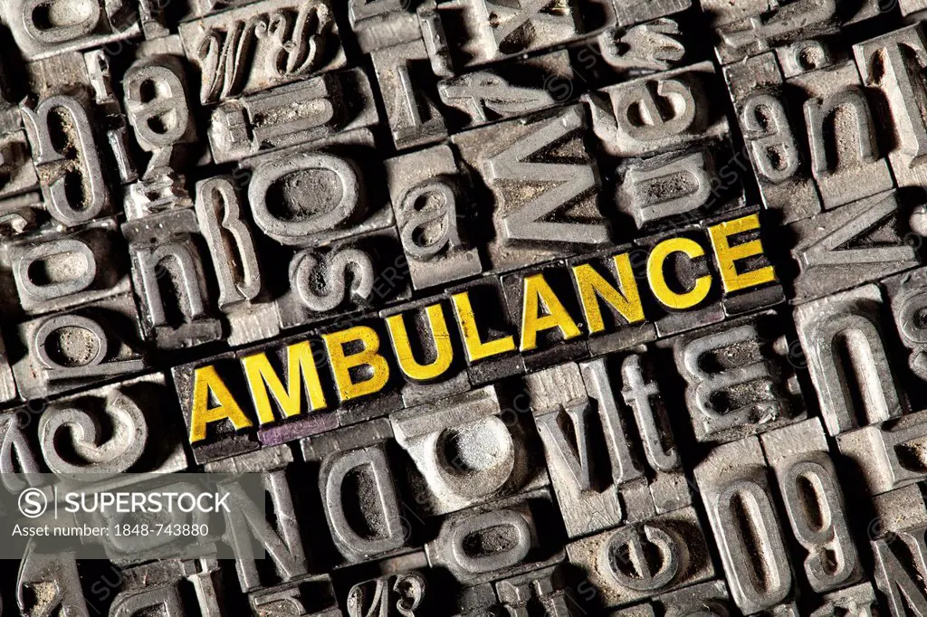 Old lead letters forming the word ambulance