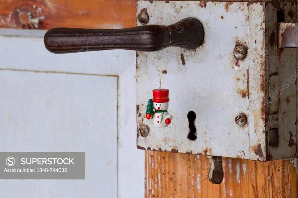 Snowman, Christmas decoration on an old doorknob